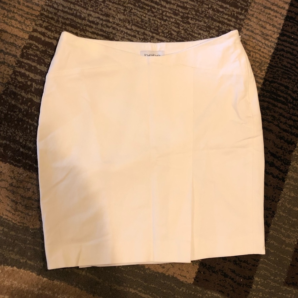 Bebe white mini skirt